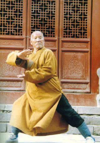 an old monk demonstrating Shaolin Kungfu