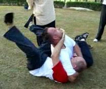 wrestling — Gold Coin Spinning on Ground